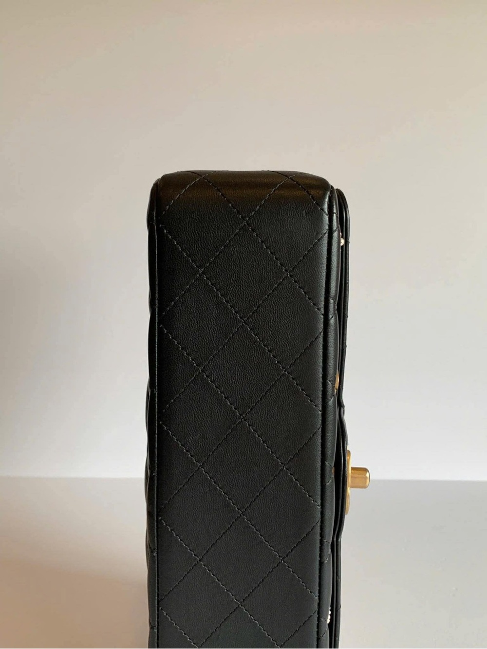 CHANEL Black Quilted Leather  Gold Accents

Classic style! - Picture 12 of 12